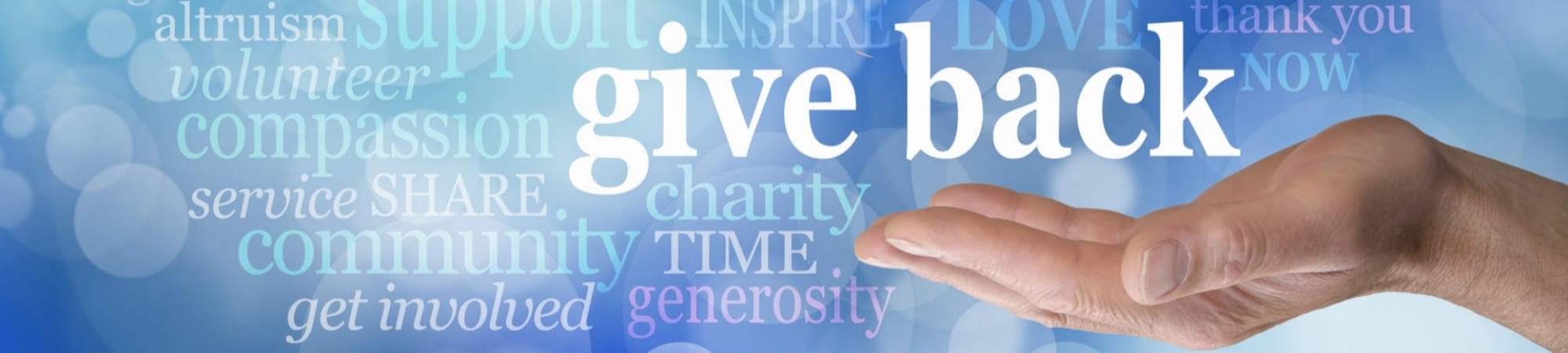 GIVE BACK word tag cloud - male hand with the words GIVE BACK floating above surrounded by a word cloud against a blue background