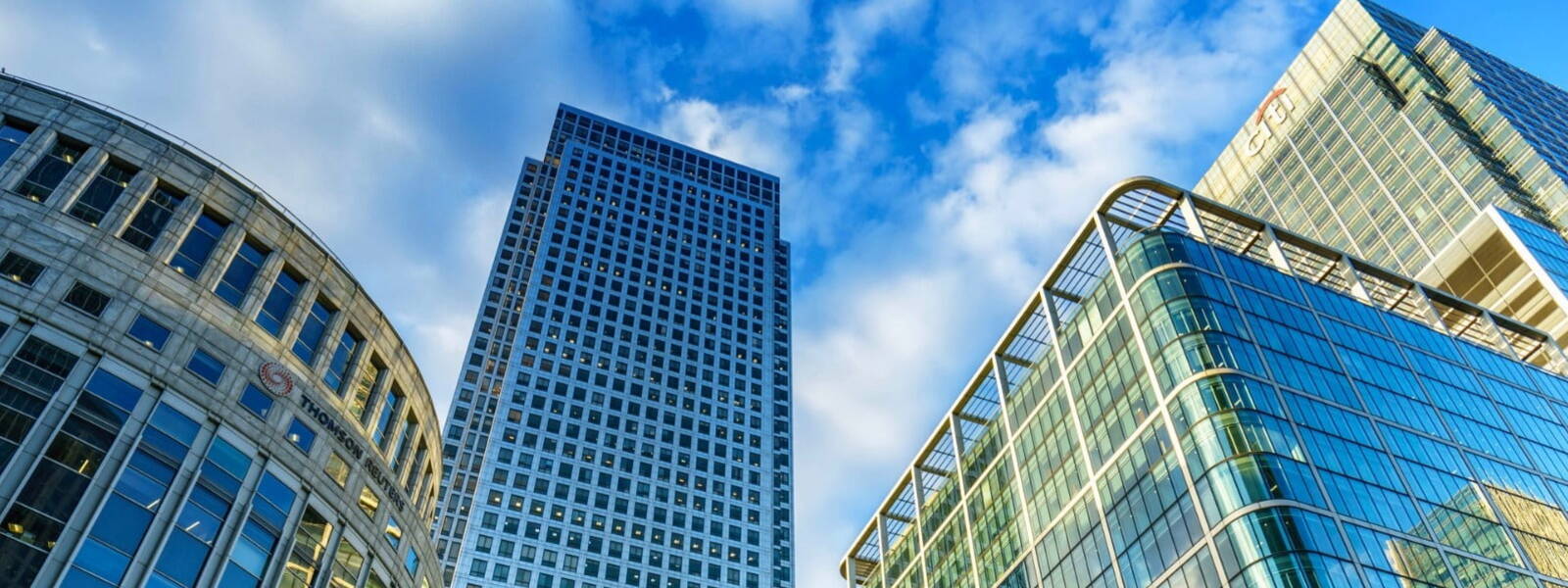 Businessman using tablet to analyze financial information and charts 
